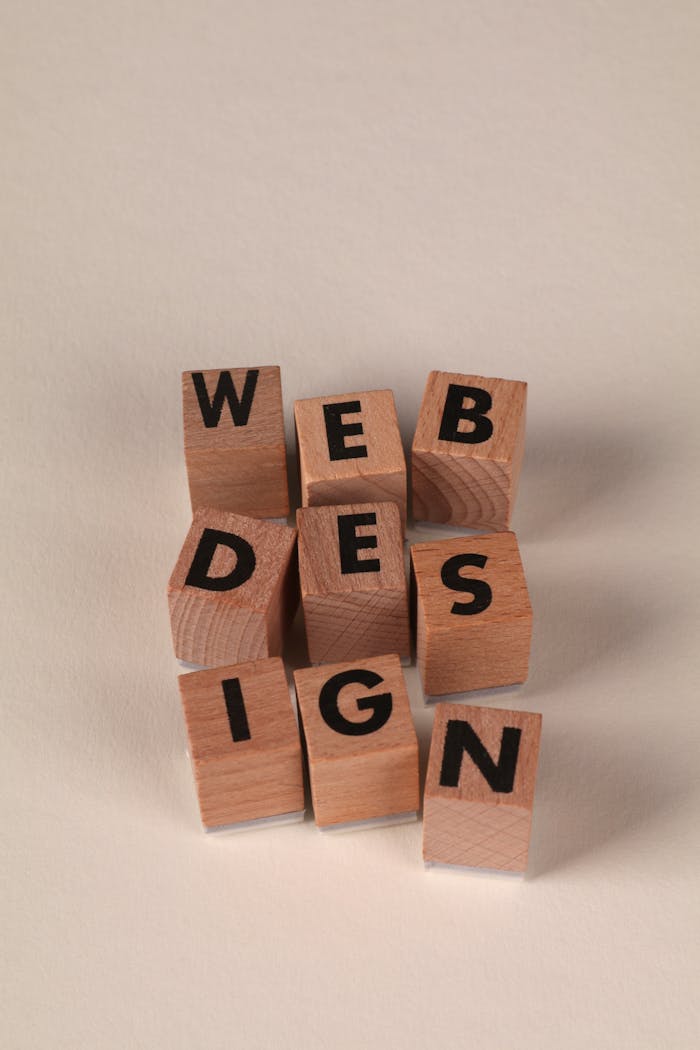 digital Wooden blocks arranged to spell 'Web Design'. Perfect for creative, digital content themes.